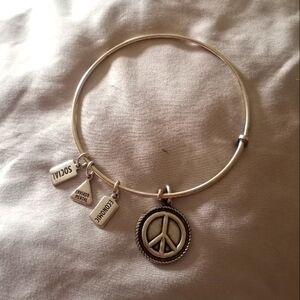 NWOT Sterling Silver Wind and Fire Peace Charm Bracelet